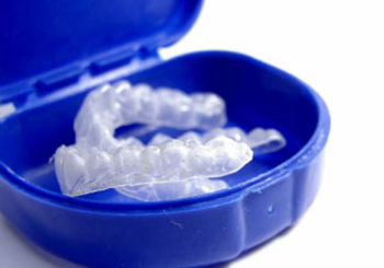 Photo of teeth whitening trays in a case, for information on DIY teeth whitening from Lowell, MA dentist Dr. Michael Szarek.